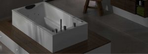 deep soaking tub on a raised plinth