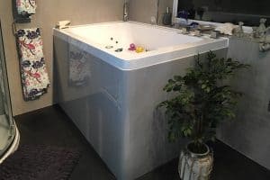 The modified deep soaking tub, with its specially shaped and coloured bath panel